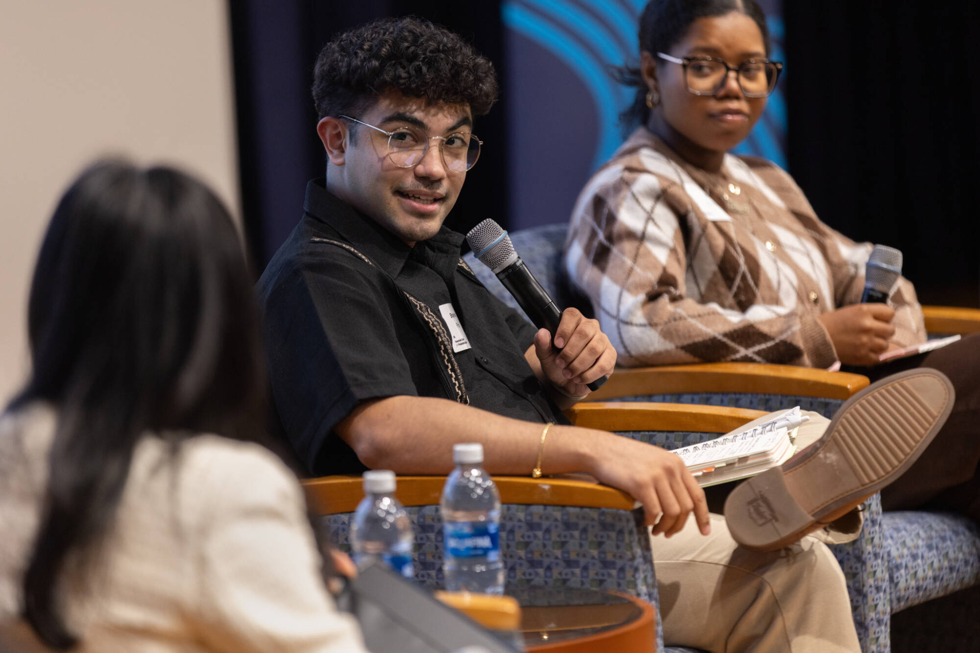 Two Cook Leadership Academy fellows speak while participatng in a panel at a Hauenstein Center event.
